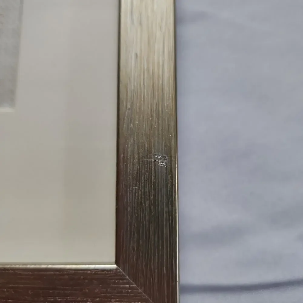 N/A tiny scratch